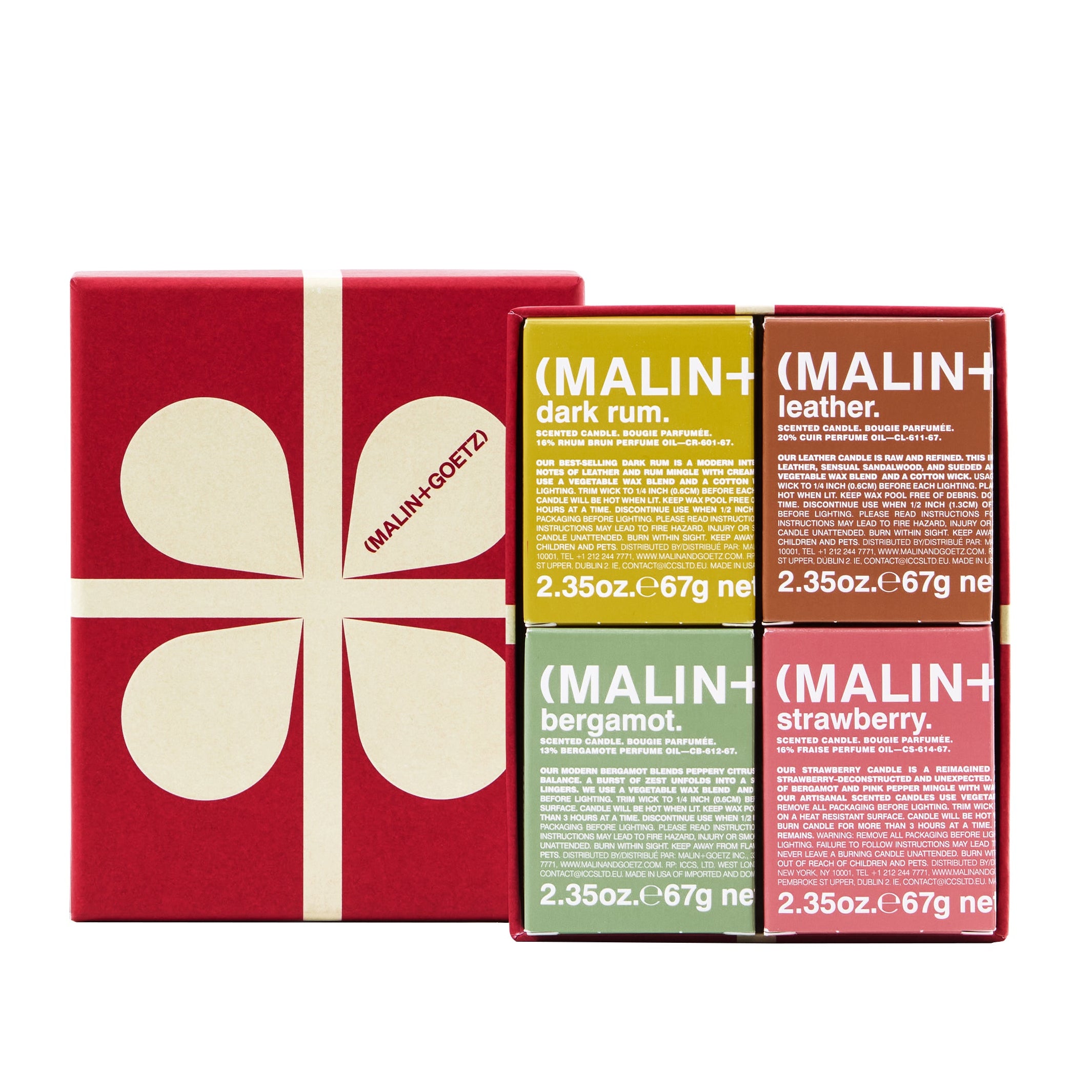Set of Malin+Goetz Scent the Box box set open in a red gift box on a white background