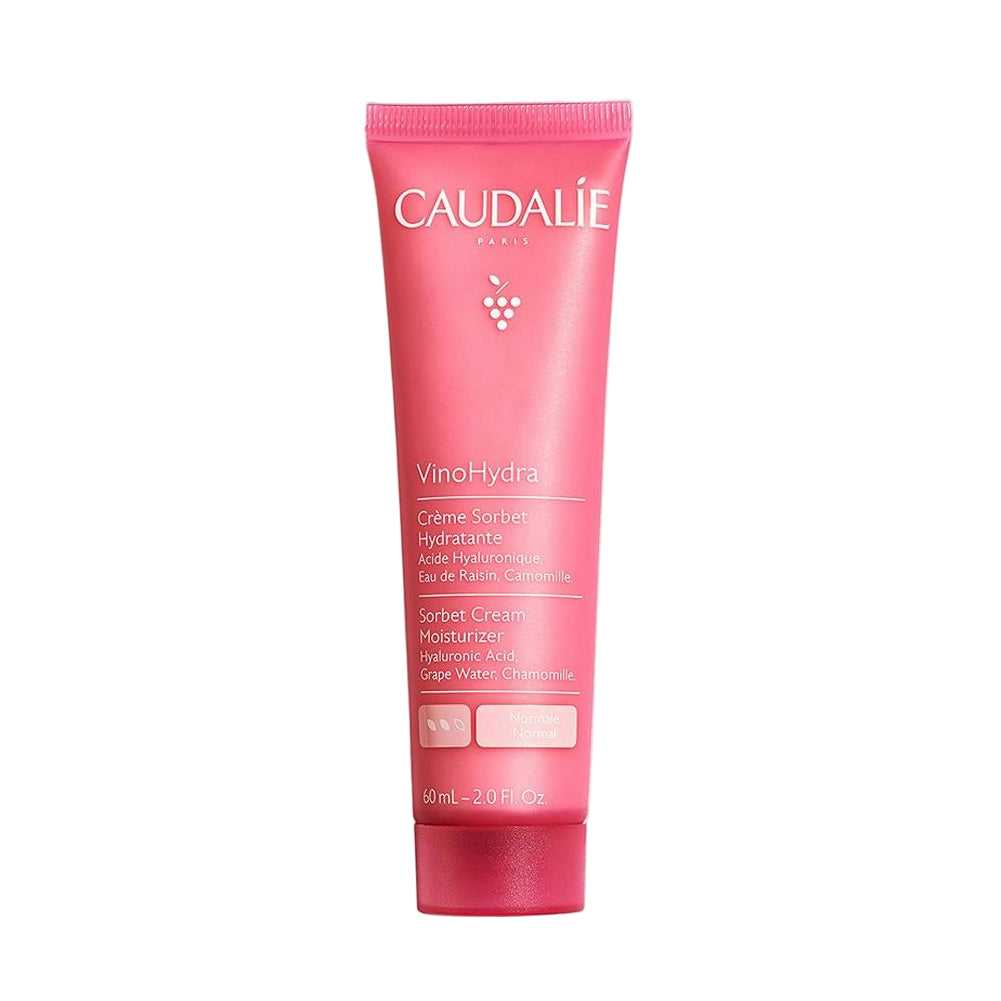 Pink Caudalie Vinohydra moisturizer skincare tube on a white background