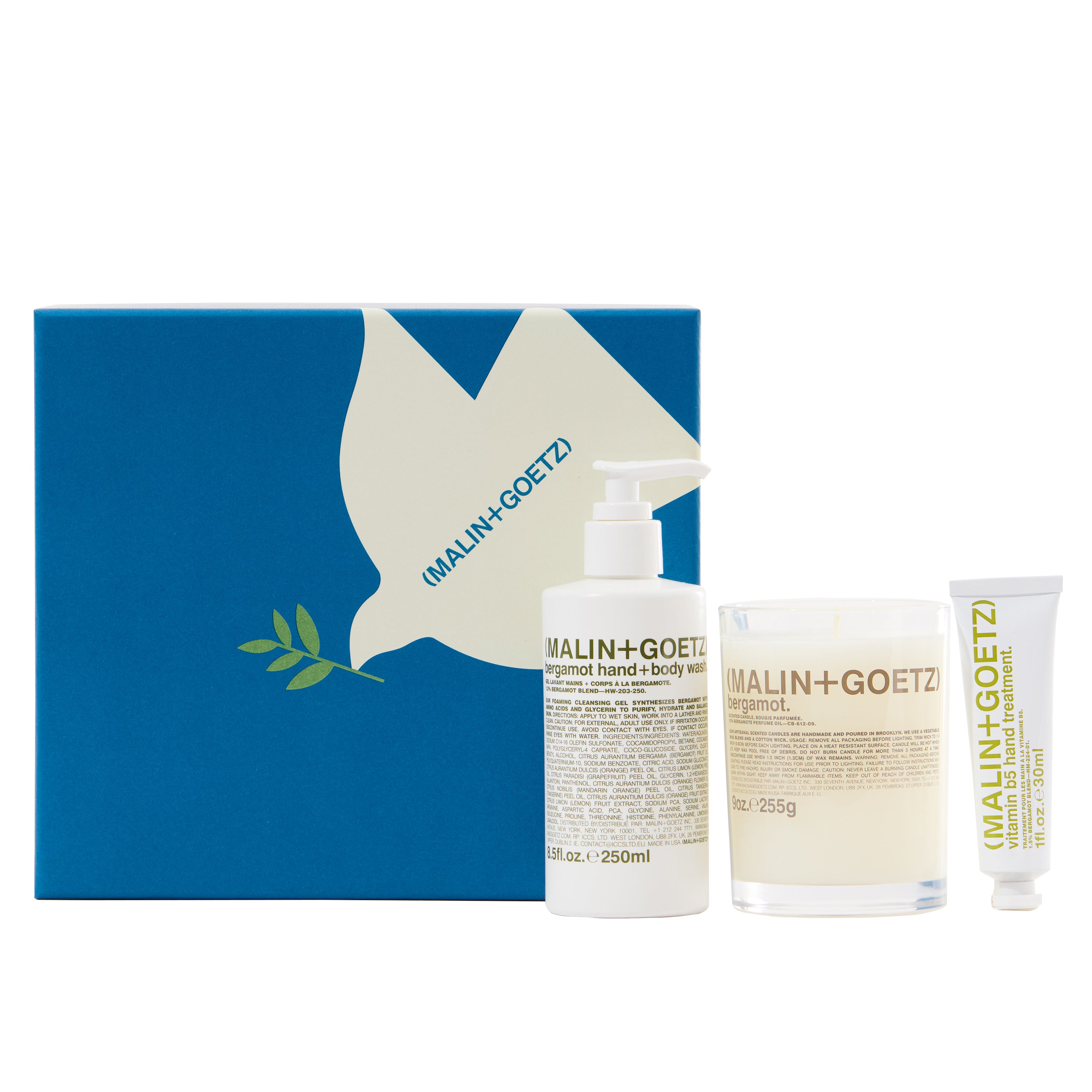 Malin and Goetz The Bright Side blue gift box with a Silhouette of a dove in white, with the contents in front of the box on a white background.