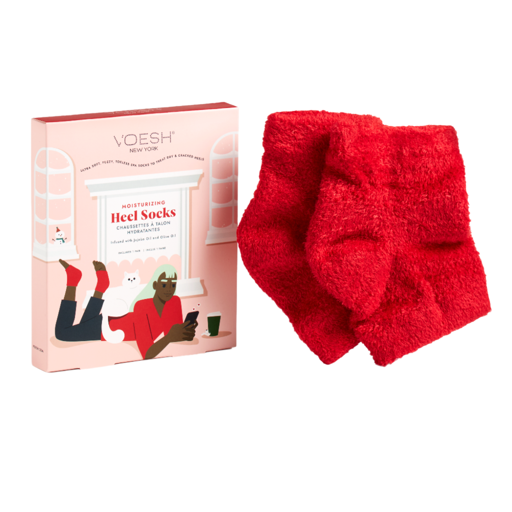 Red Heel Socks next to Voesh packaging Box that has an illustration of a woman in a red sweater with the red heel socks on. 