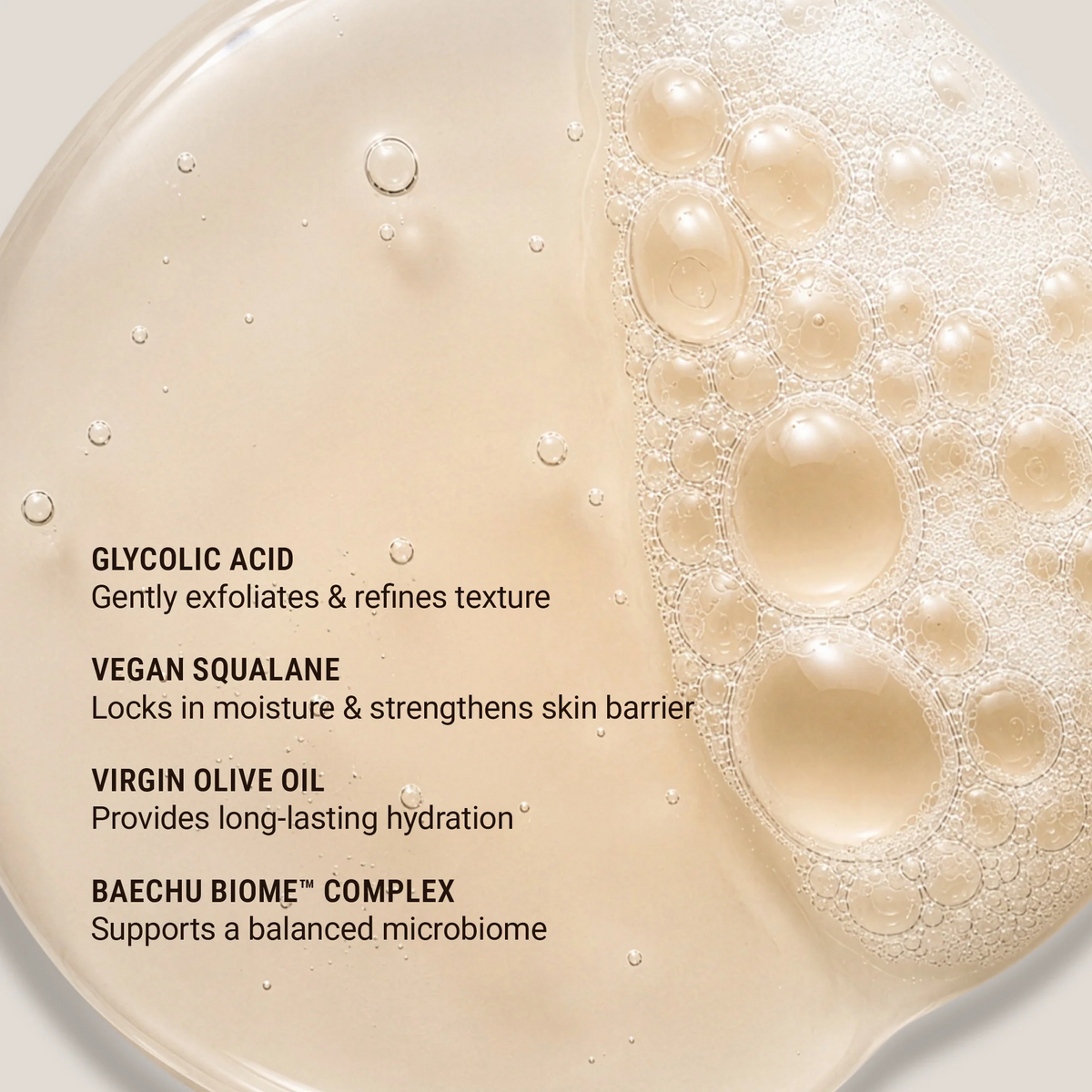 Skincare product with bubbles and text detailing ingredients on a light background